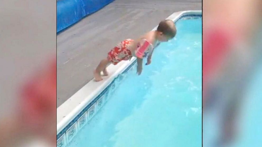 VIDEO: Two-year-old boy performs unique dive into swimming pool