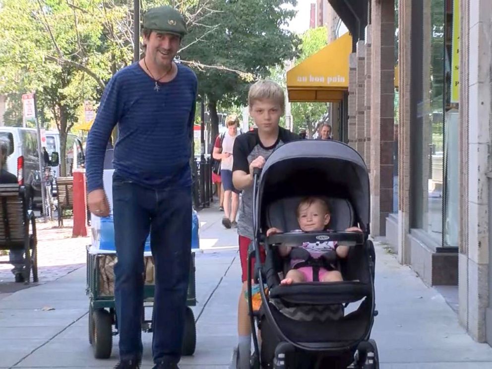 PHOTO: Liam Hannon, 10, hands out homemade lunches to the homeless population of Cambridge, Massachusetts, along with help from his father, Scott Hannon.