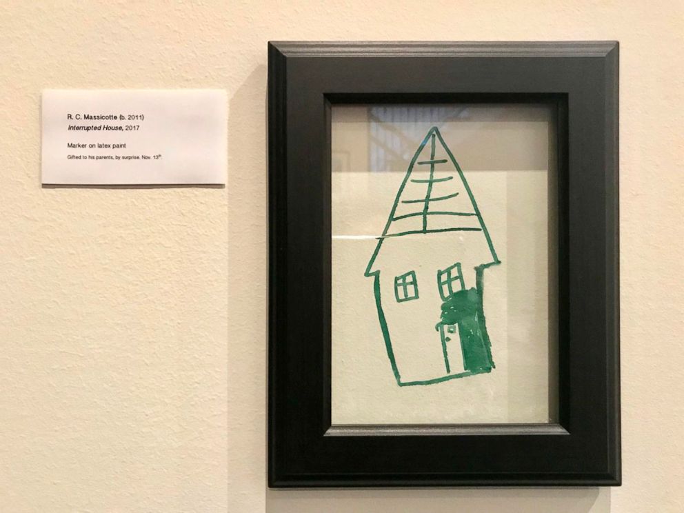 Mom turns son's mischievous drawing on a wall into gallery 'masterpiece