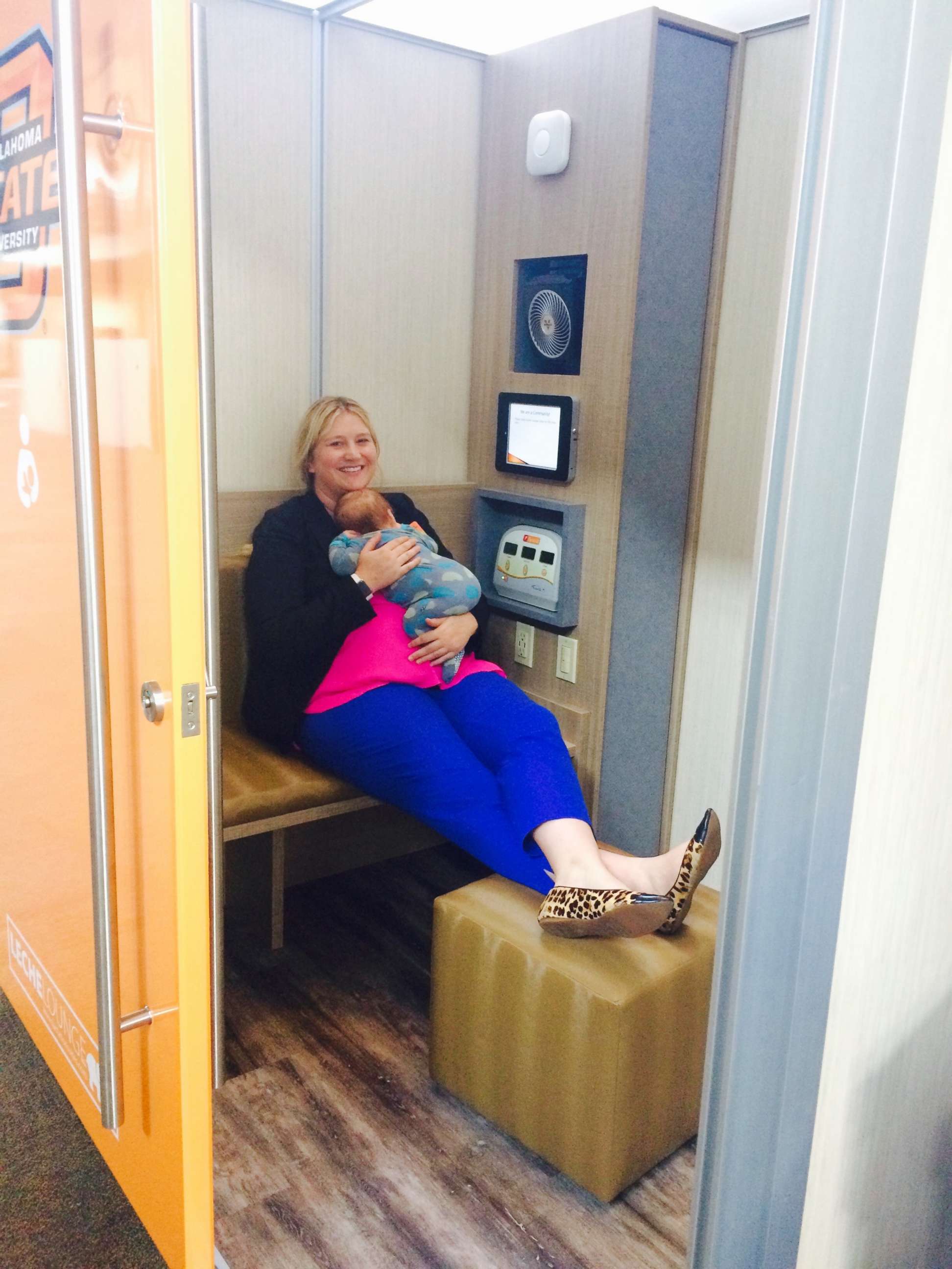 PHOTO: Stephanie Conduff sits inside a Leche Lactation suite with her son, Guthrie.