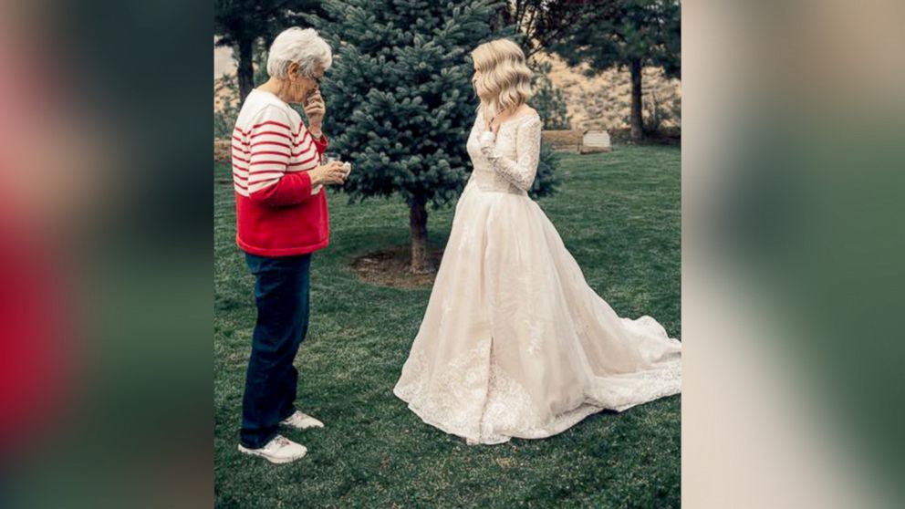 PHOTO: Wedding photographer captures "first look" photos between a bride and her grandmother.