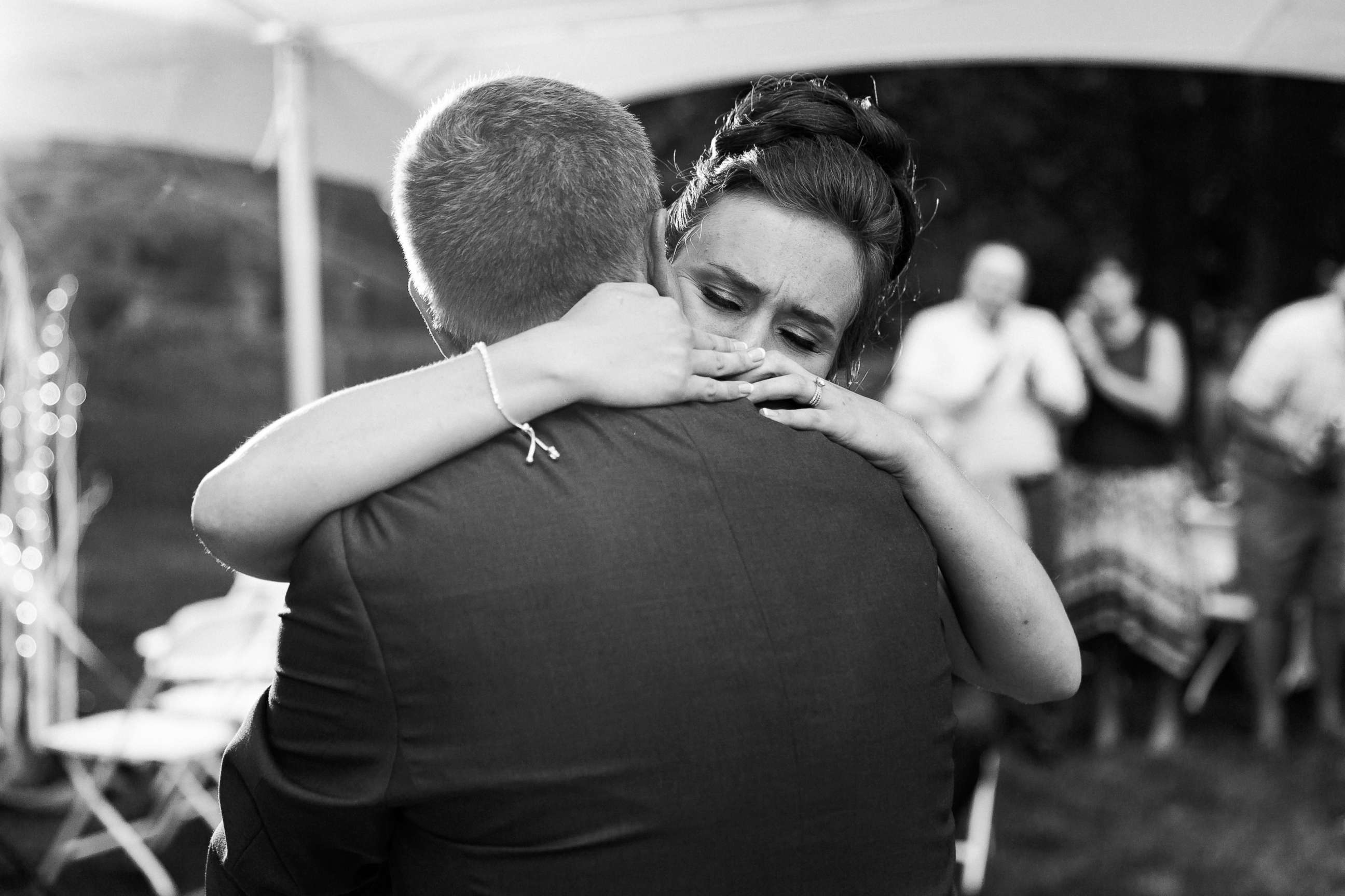 PHOTO: Dad Paul Fick gave his daughter a big hug after they finished their father-daughter dance.