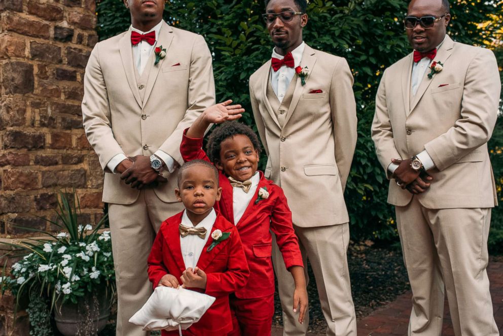 PHOTO: A waving Bryson Suber, 6, looks at his mother Tearra Suber as she walks down the aisle on Sept. 4, 2016.