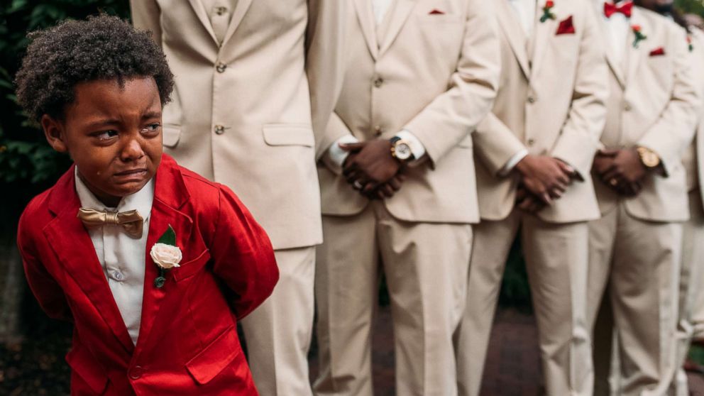 A photo of Bryson Suber, 6, sobbing as he watches his mother Tearra Suber walk down the aisle has gone viral.