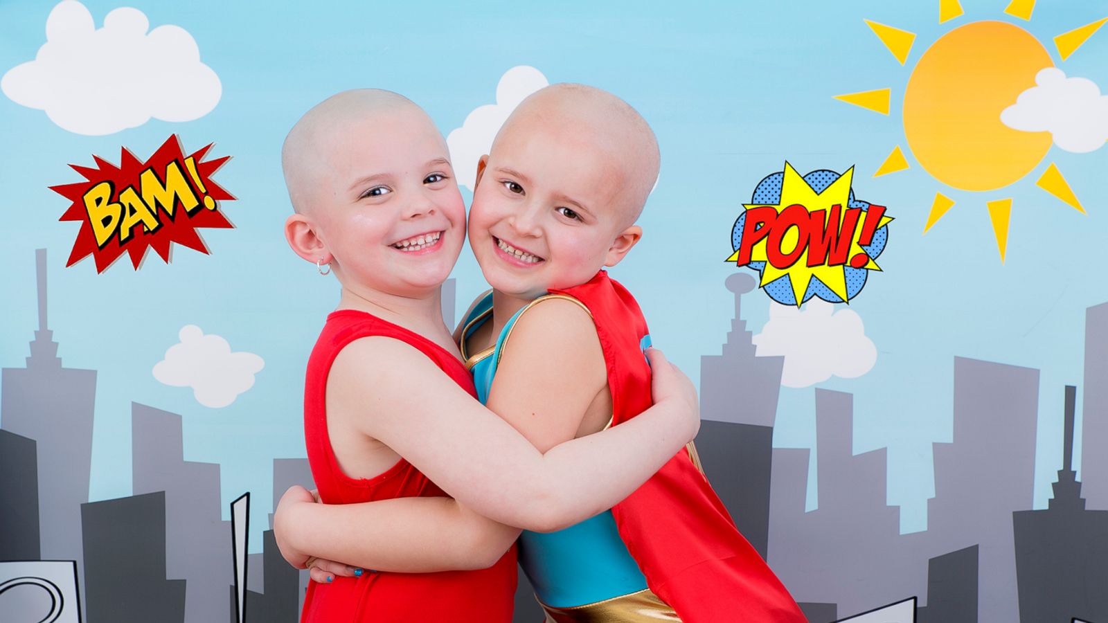 PHOTO: Ella Watters, 6, poses with her friend Emma Zielinski, 5, who shaved her head for her.