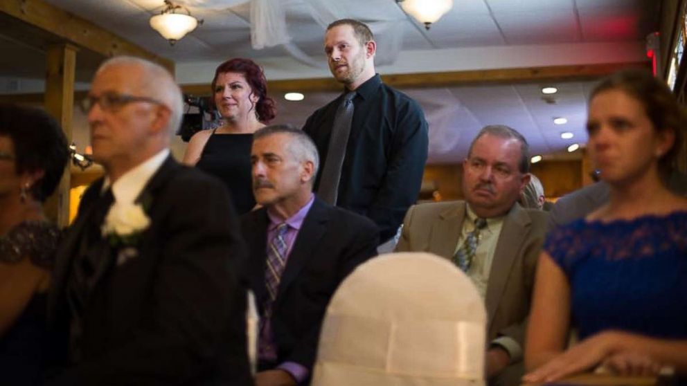 PHOTO: Casey Bender seen with her husband ,Tyler Bender, at the wedding ceremony of her son's father. 