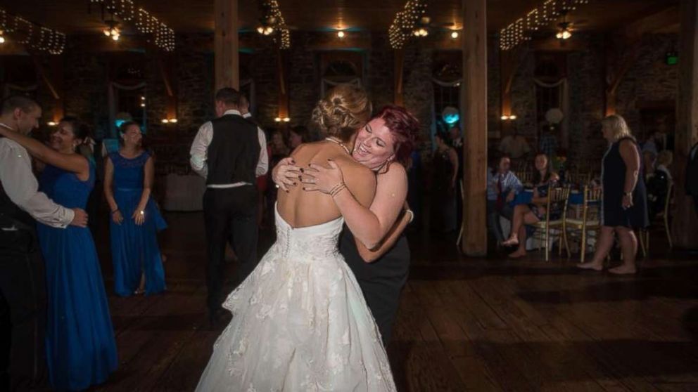 PHOTO: Katie Musser embraces her stepson's mother Casey Bender on her wedding day, September 23, in Pennsylvania. 