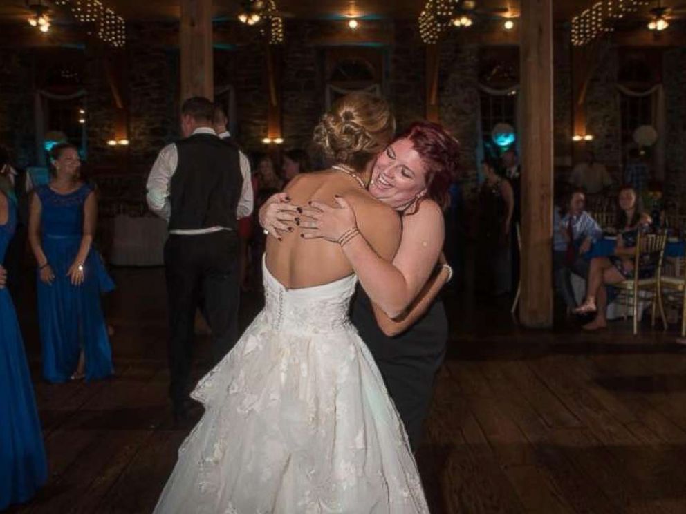 PHOTO: Katie Musser embraces her stepsons mother Casey Bender on her wedding day, September 23, in Pennsylvania.