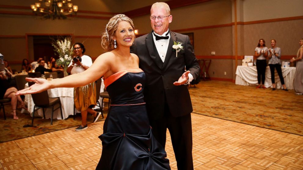 Brittney Harmon surprised her die-hard Bears fan father, Steve Benda, by wearing a team-themed dress at her wedding on July 22. 