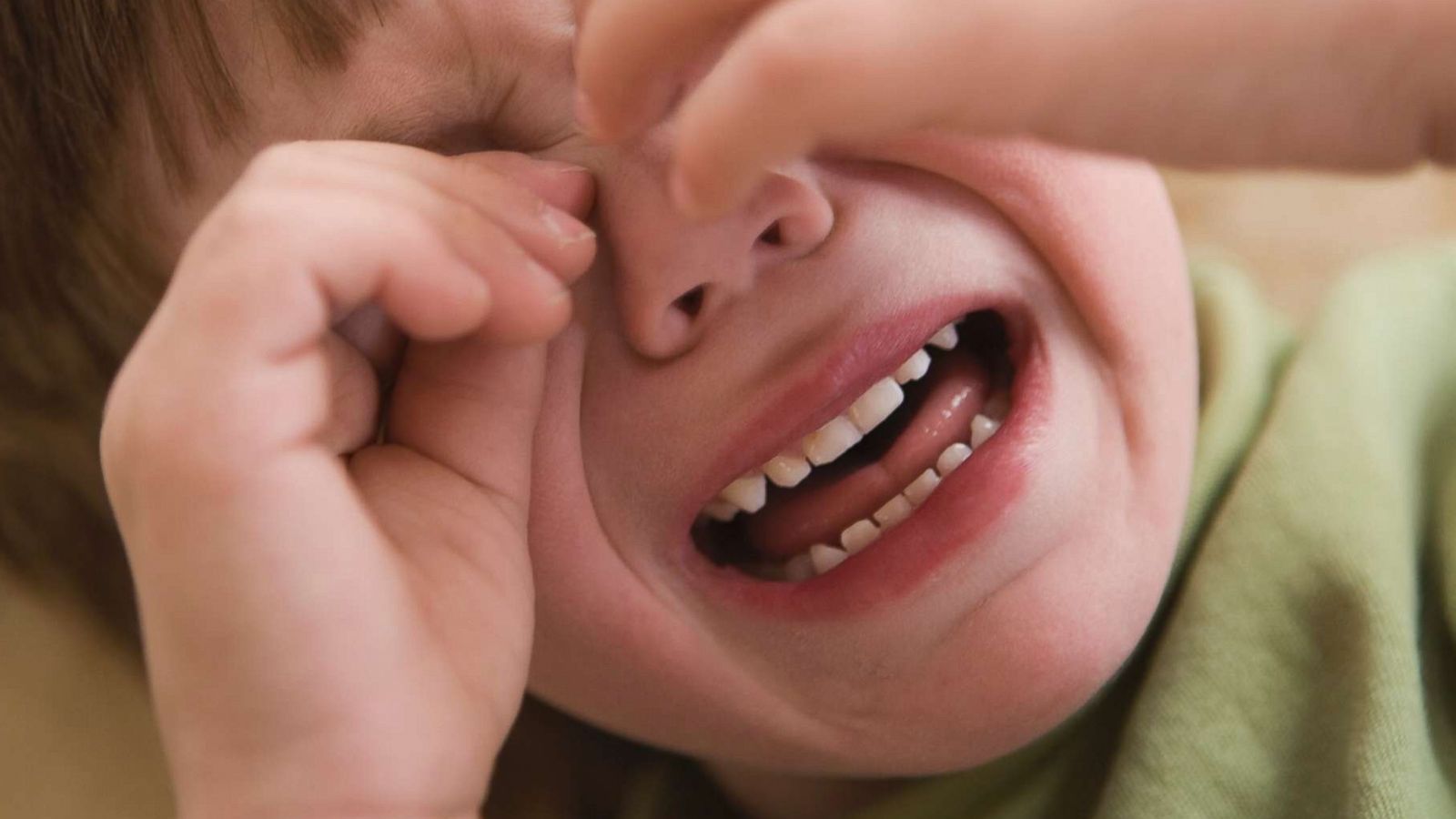 PHOTO: A young boy crying with his hands covering his face having a tantrum in this undated stock photo.