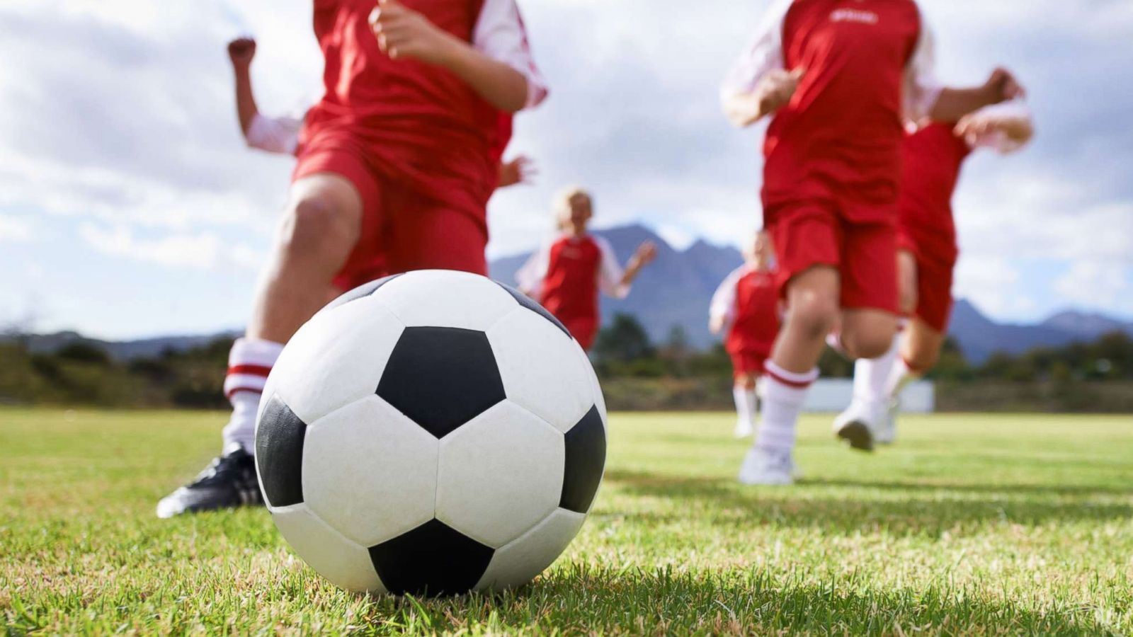 PHOTO: Children kick a soccer ball in an undated stock photo.