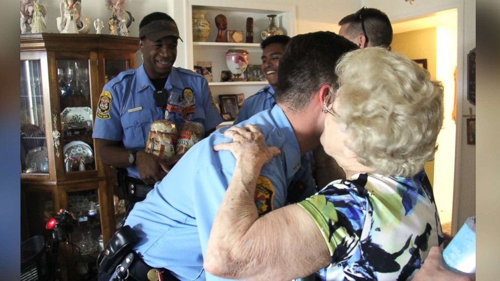 PHOTO: Betty Helmuth, 94, of Clearwater, Fla., answered her door on Sept. 7, 2017, for Officer James Frederick and his colleagues of the Clearwater Police Department who greeted her with hurricane supplies before losing power from Hurricane Irma.