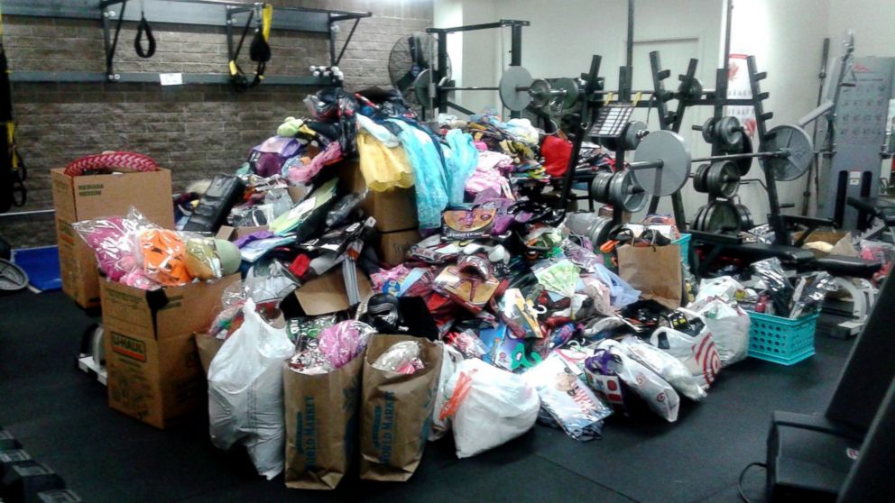 PHOTO: Halloween costumes donated by people across the country were stored in the gym of the Santa Rosa Police Department before being given away.