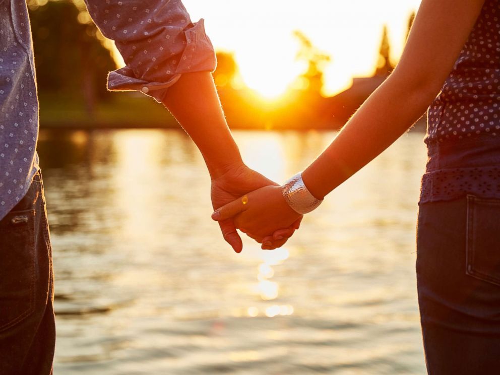 PHOTO: A couple holds hands by the river in this undated stock photo. PHOTO: A couple holds hands by the river in this undated stock photo.