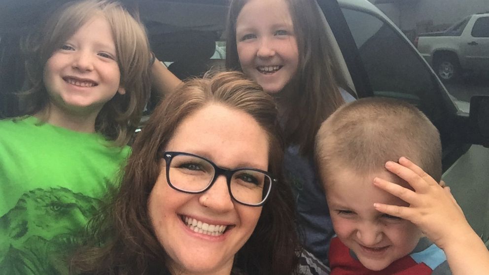 Courtney Adams, of Auburn, Alabama, poses with her children in this undated photo.