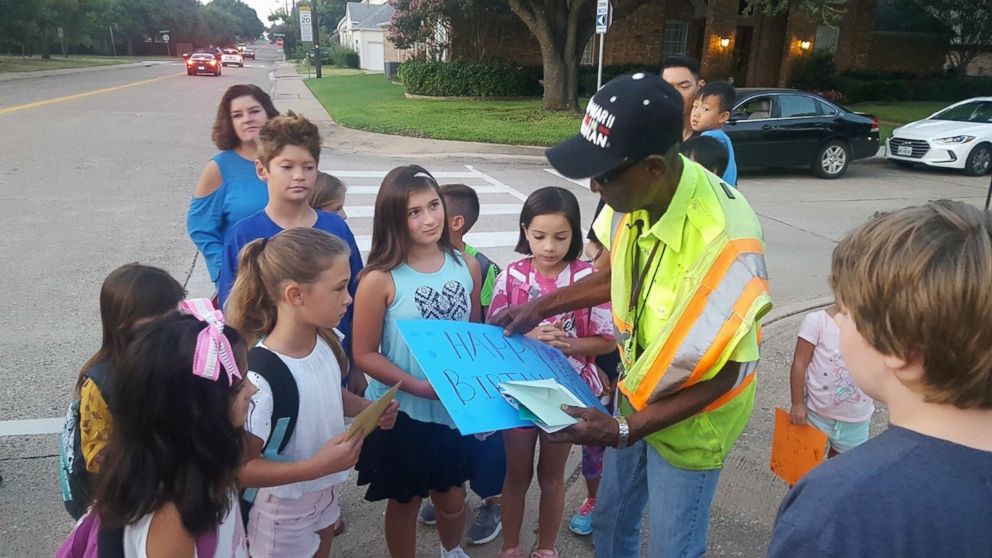 PHOTO: Luther Walker, 94, a crossing guard at Mitchell Elementary School in Dallas, was showered with gifts for his birthday
