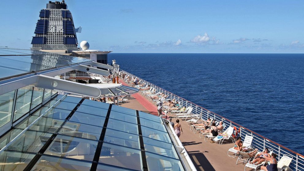 PHOTO: Passengers sunbathe aboard Celebrity Cruises Inc.'s Constellation in the Caribbean Sea near the coast of Cuba on Sunday, Dec. 16, 2012. 