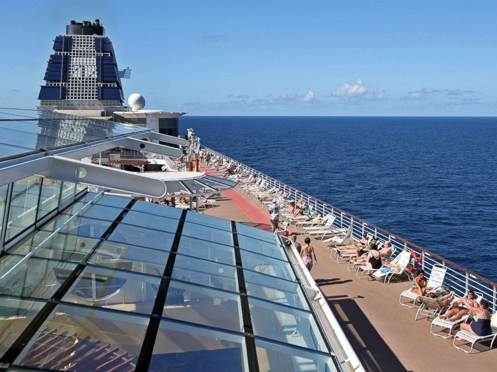 PHOTO: Passengers sunbathe aboard Celebrity Cruises Inc.s Constellation in the Caribbean Sea near the coast of Cuba on Sunday, Dec. 16, 2012.