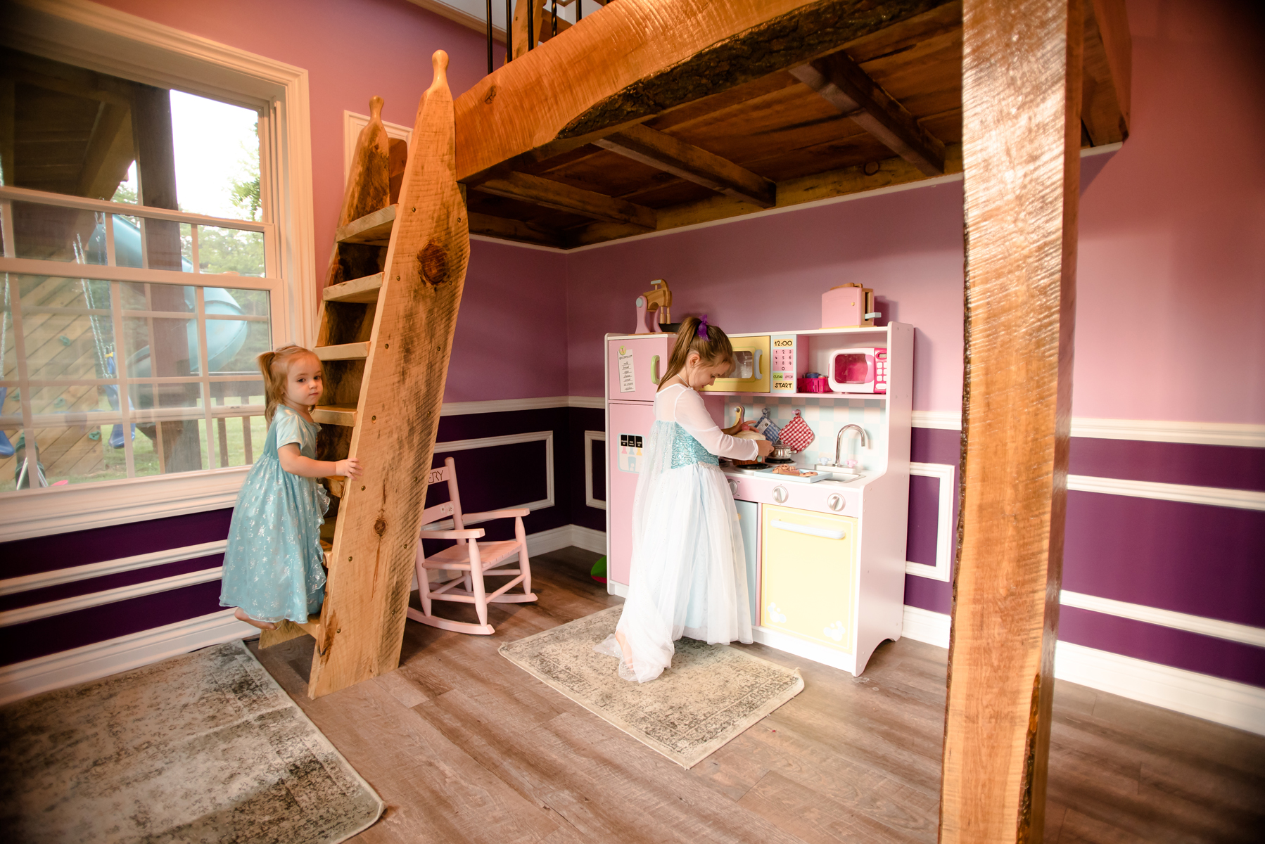 PHOTO: Michigan dad Adam Boyd built his daughters an amazing two-story playhouse with porches, a rock wall and 8-foot ceilings. 