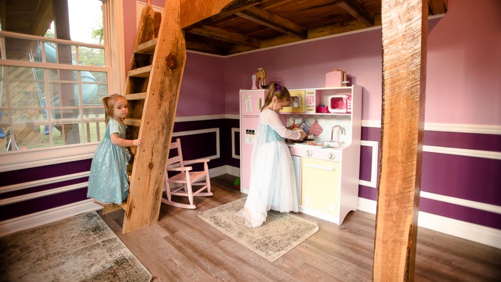 PHOTO: Michigan dad Adam Boyd built his daughters an amazing two-story playhouse with porches, a rock wall and 8-foot ceilings. 