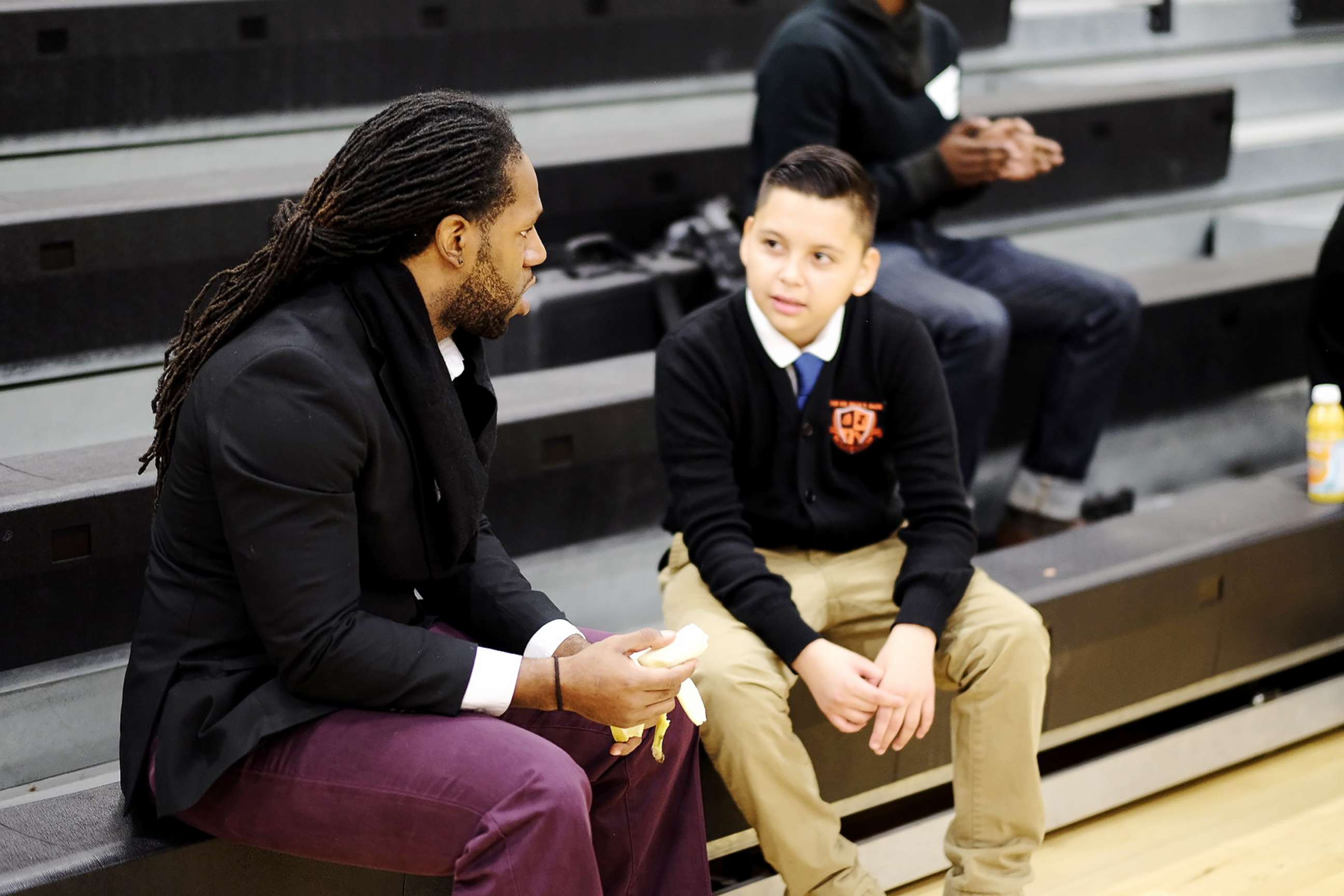PHOTO: A mentor and a student talk during Billy Earl Dade Middle School's "Breakfast with Dads" event on Dec. 14, 2017.
