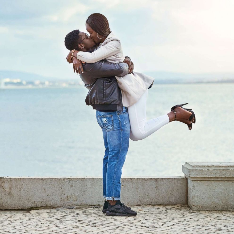 PHOTO: A man lifts a woman while embracing her in an undated stock photo.