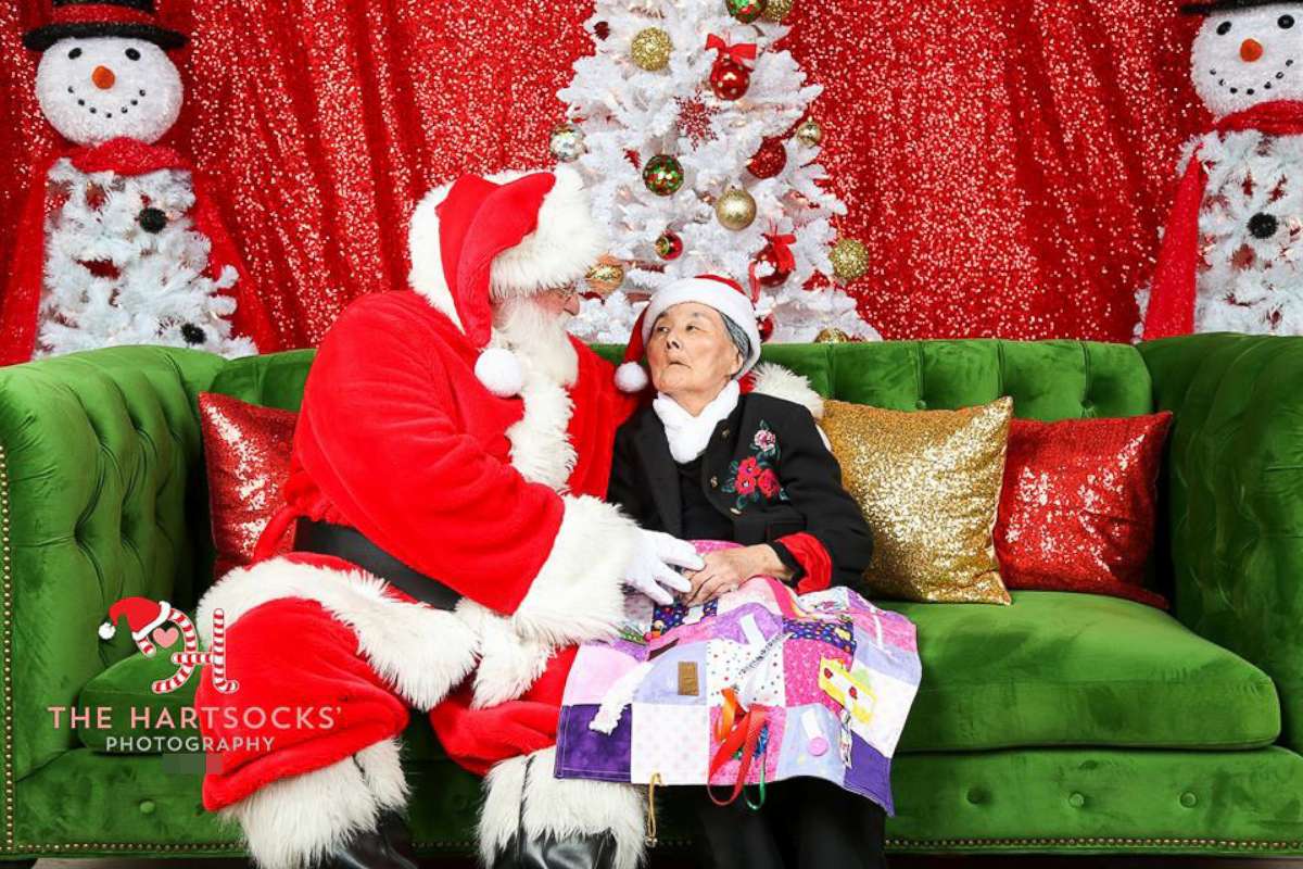 PHOTO: Karen Rangel, who's in the final stages of dementia, sits with Santa Claus at a photo shoot on Dec. 9, 2017.