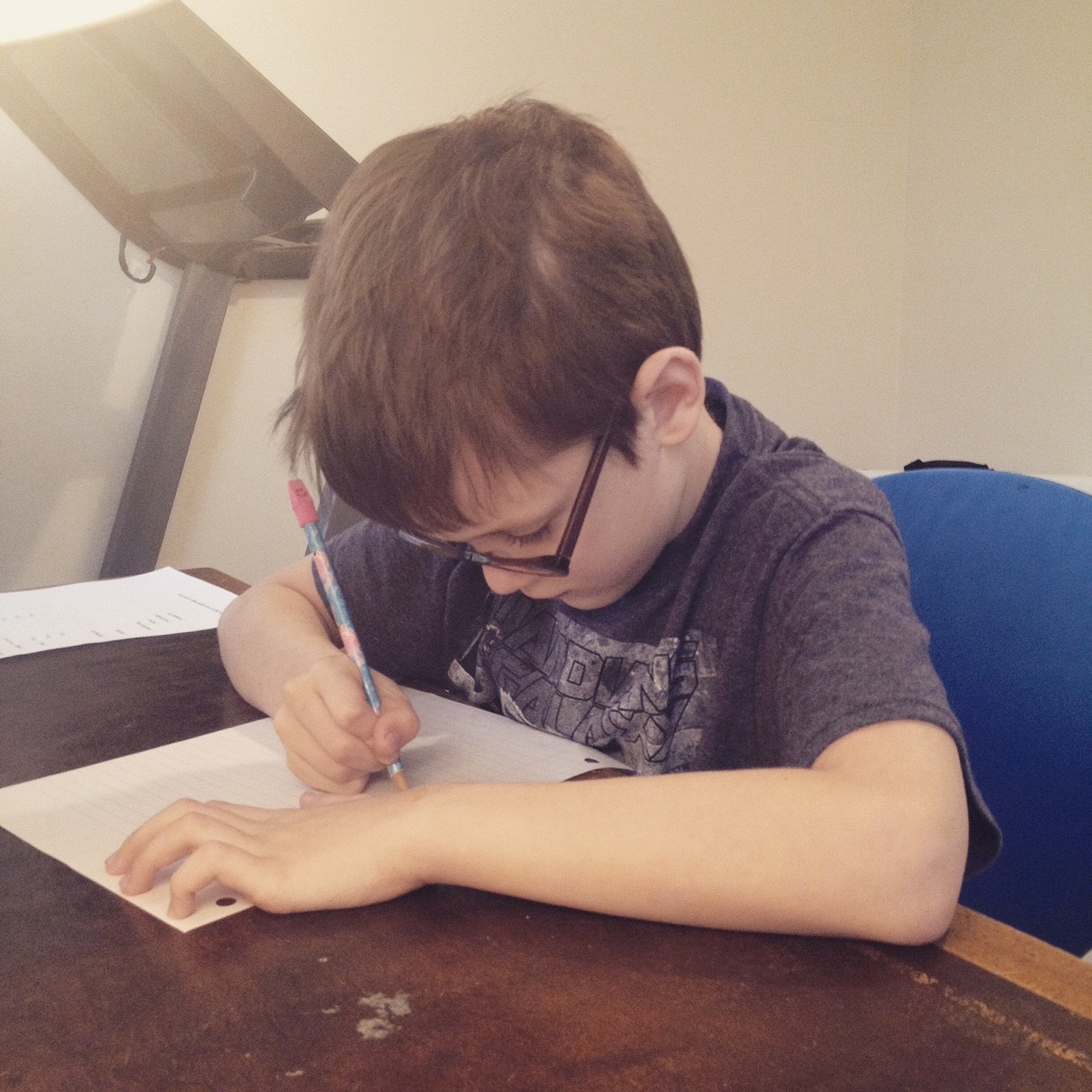 PHOTO: Beckett Dillon studies in his family's home in this 2015 photo.