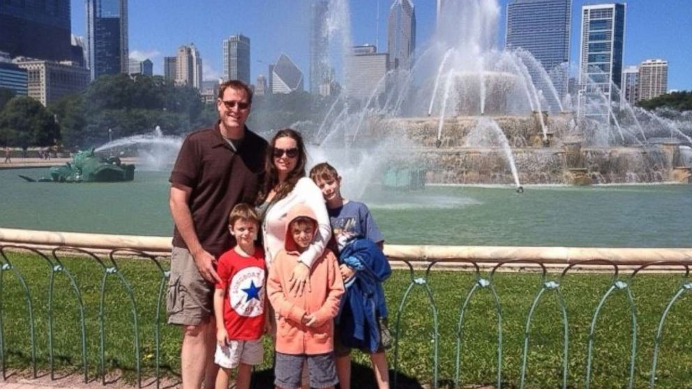 PHOTO: Dan and Anne Dillon pose with their three sons on a family trip to Chicago.