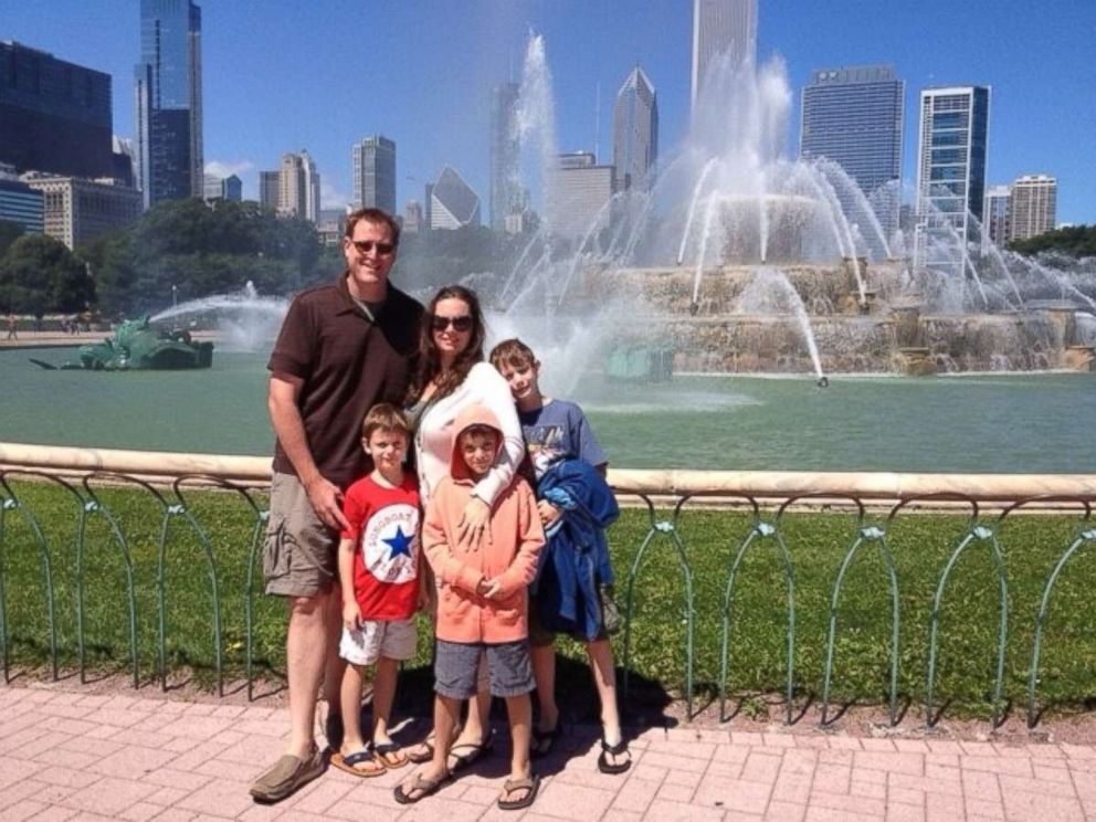 PHOTO: Dan and Anne Dillon pose with their three sons on a family trip to Chicago.