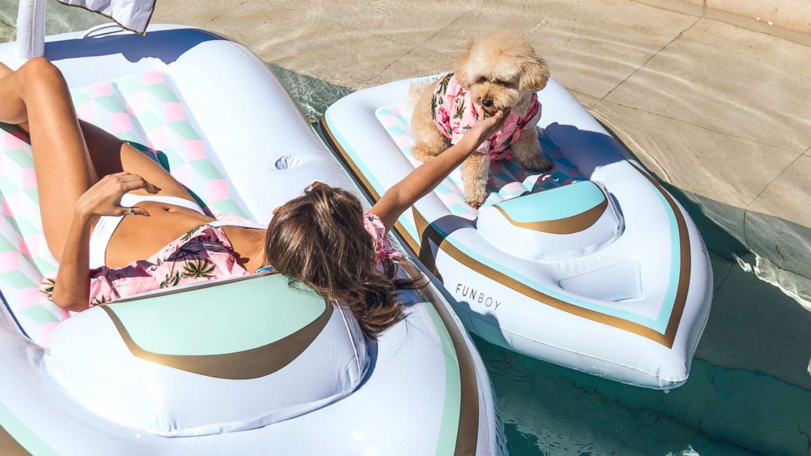 PHOTO: Bark Shop sells two styles of inflatable rafts for dogs so that they can enjoy lounging in the pool this summer too!