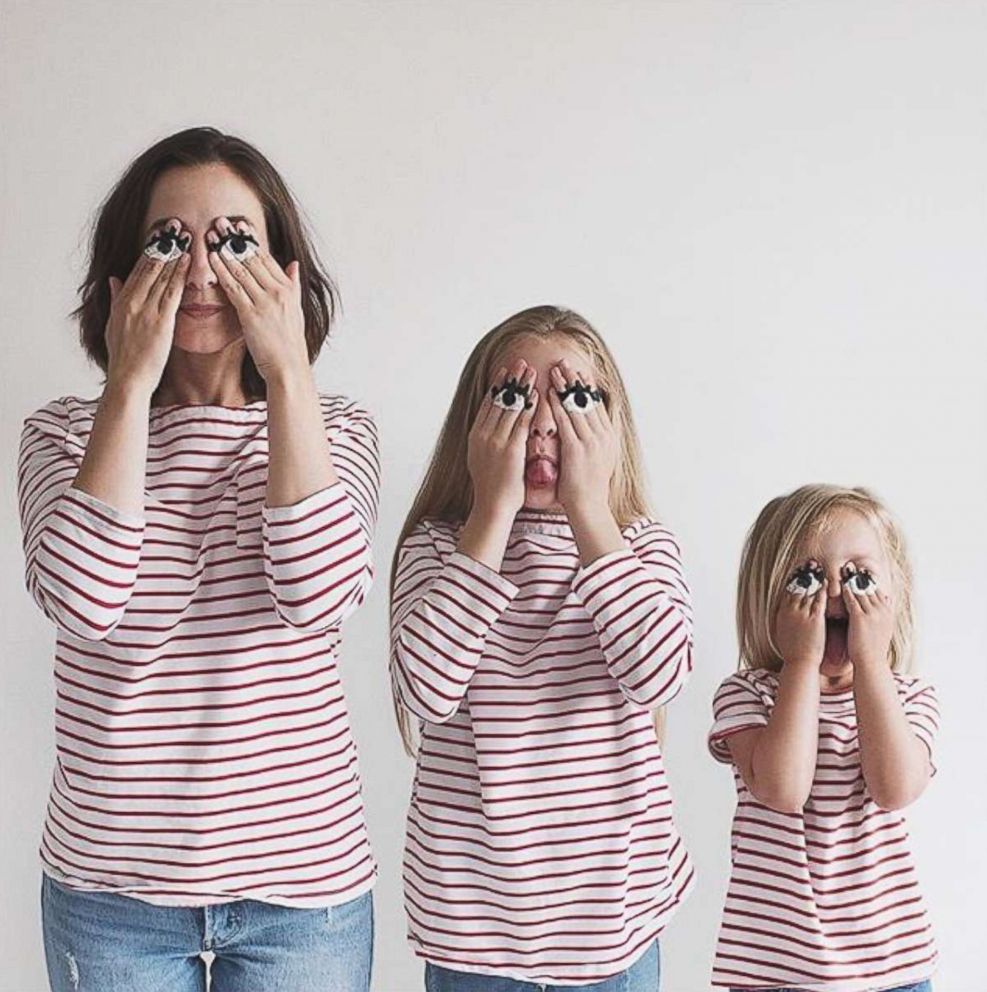 PHOTO: Dominique Davis does a silly face with her daughters Penny, 4, and Amelia, 11.