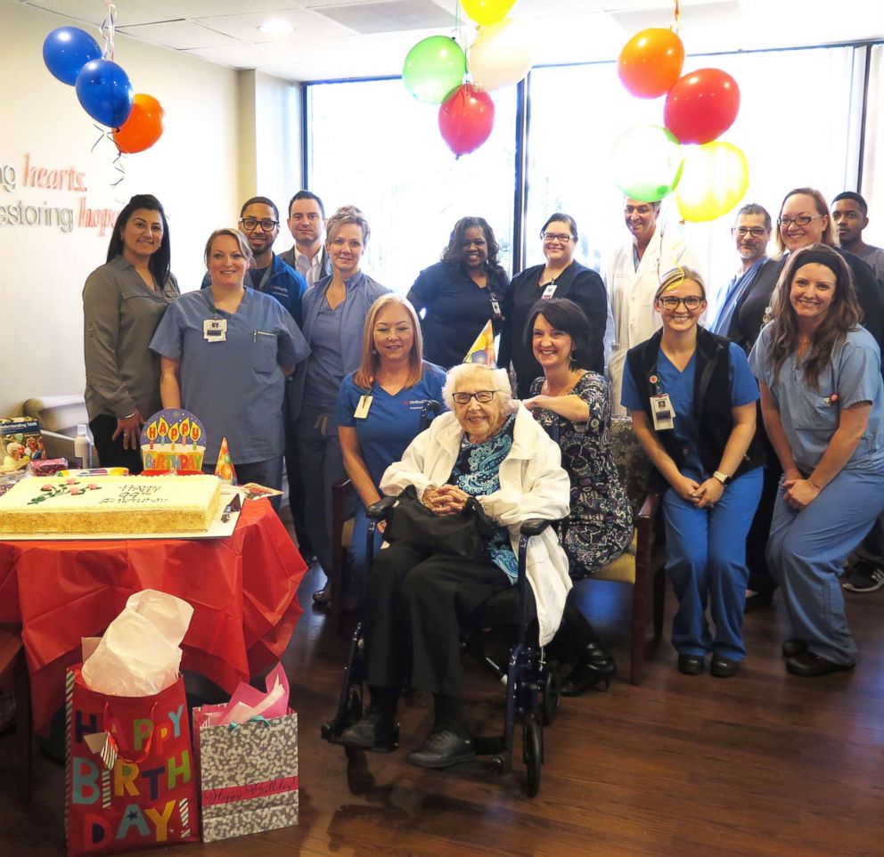 PHOTO: The staff at Medical City Dallas in Texas pose with birthday girl, Dorothy Lowman.             