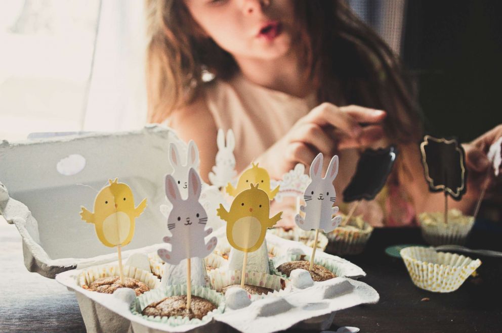 PHOTO: A girl decorates muffins for Easter in an undated stock photo.