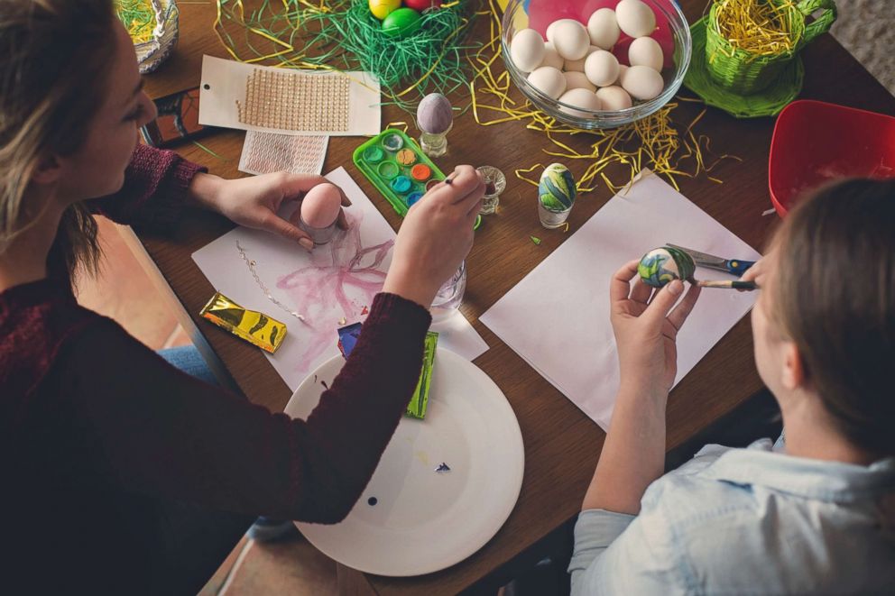 PHOTO: Two young women coloring eggs for Easter in an undated stock photo. 