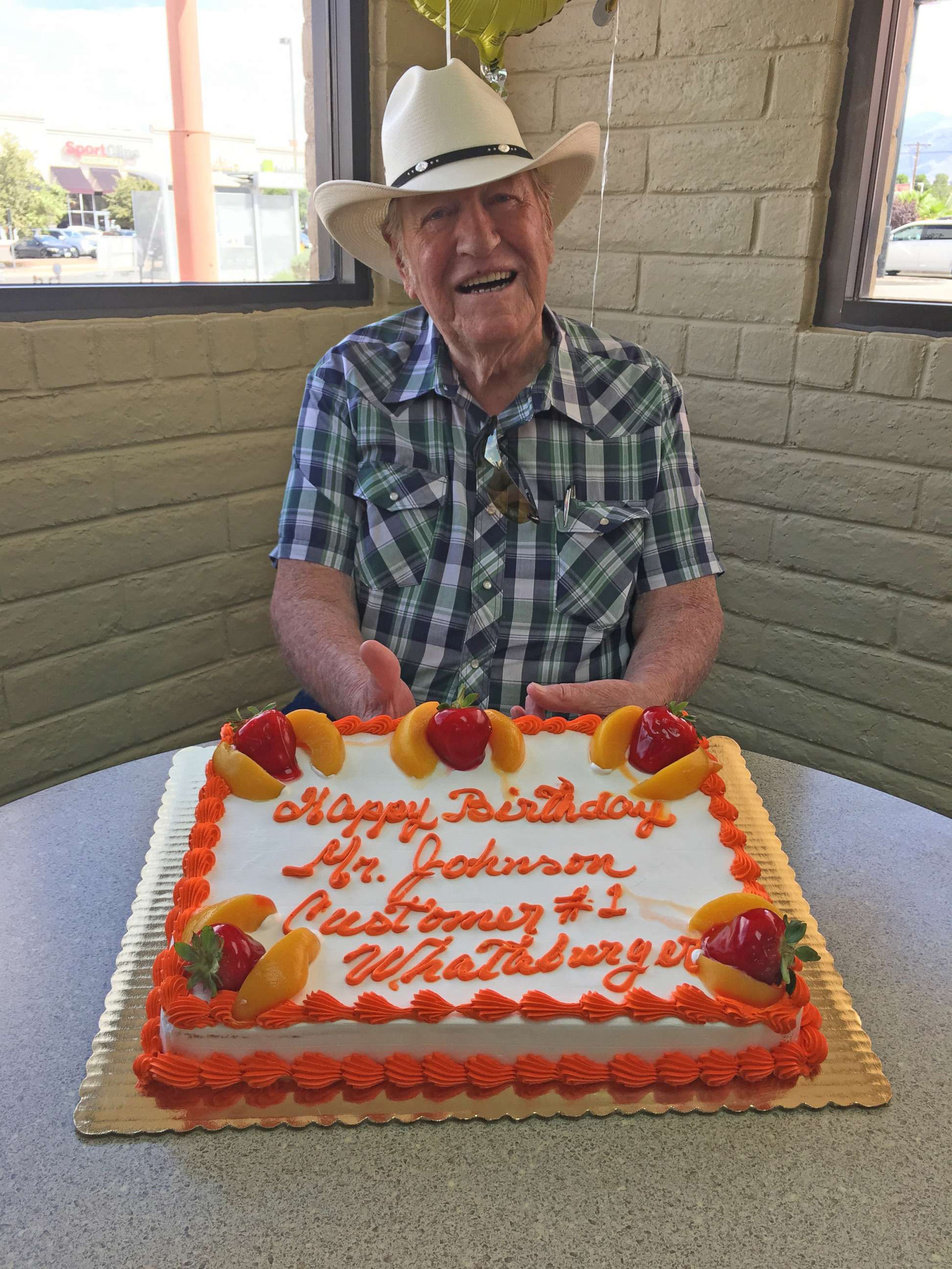 PHOTO: Ed Johnson, a loyal Whataburger customer, was surprised with balloons and cake when he arrived on his 80th birthday. 