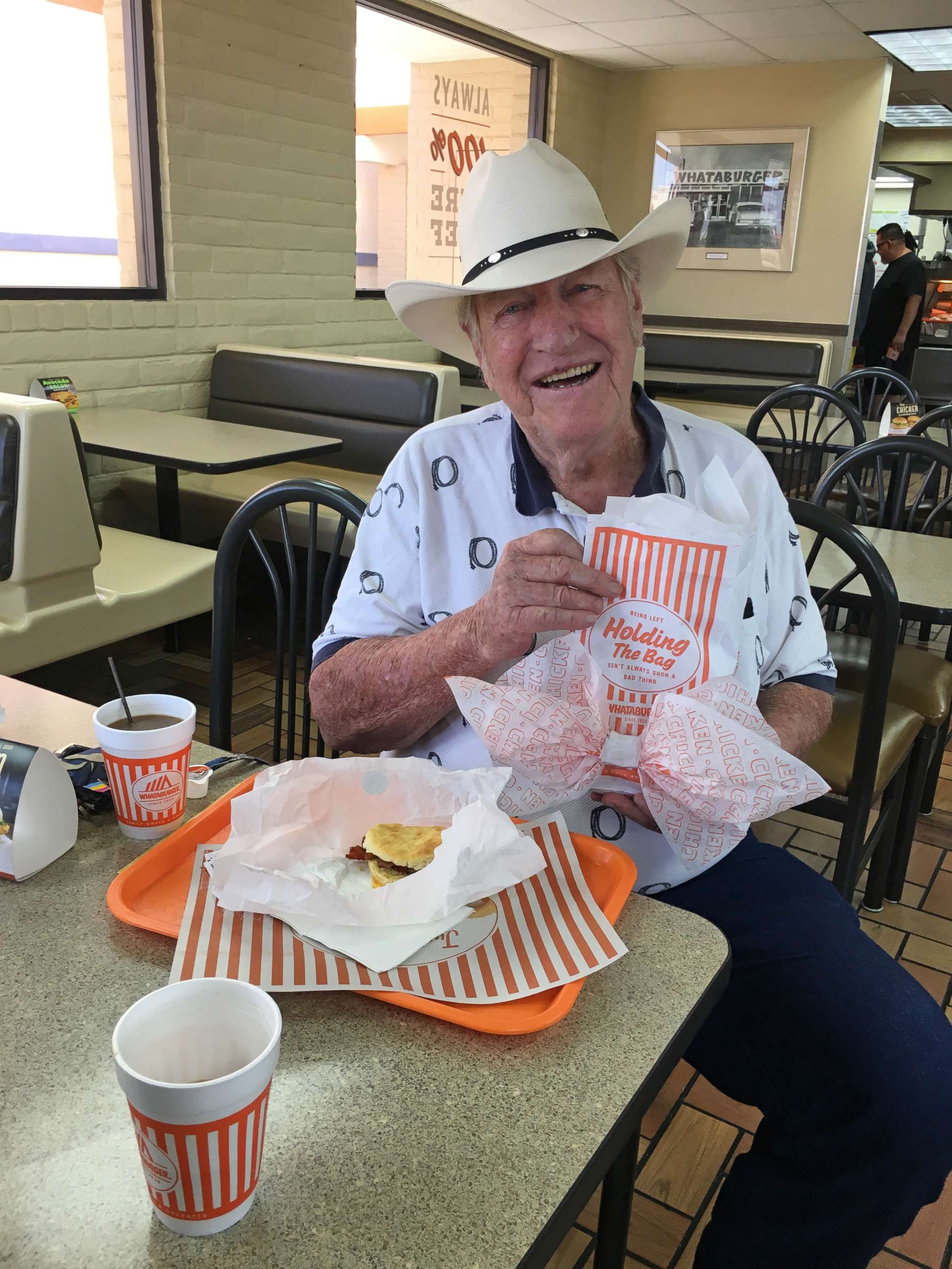 PHOTO: Ed Johnson of El Paso, Texas, orders a Whataburger bacon, egg and cheese biscuit with a coffee every day for breakfast.
