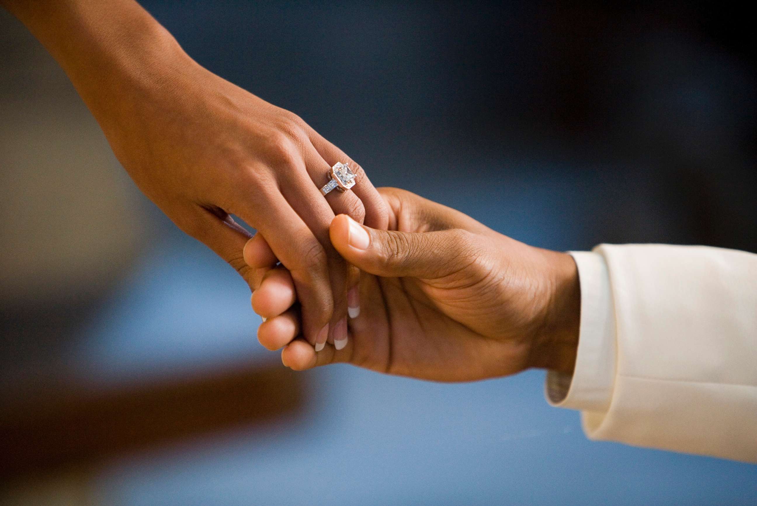 PHOTO: A man and woman hold hands showing off a large diamond ring in this undated stock photo.