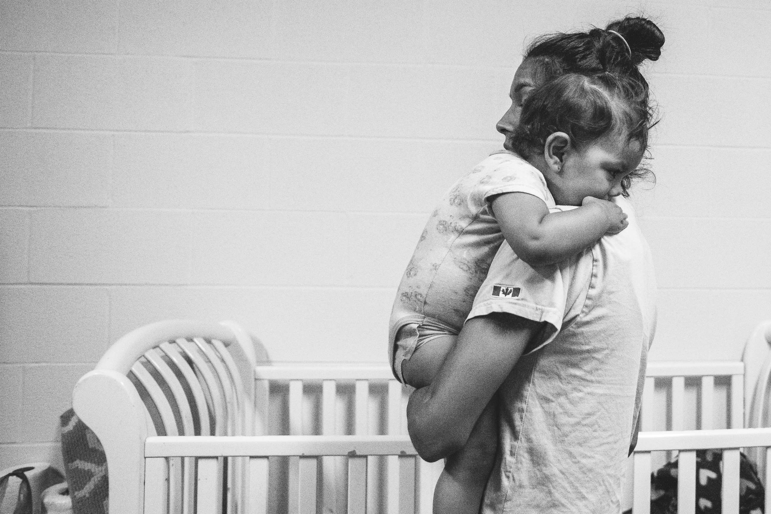 PHOTO: Sara Easter’s photo series, “Sheltered,” shows the love and struggles of a family living in a shelter. 