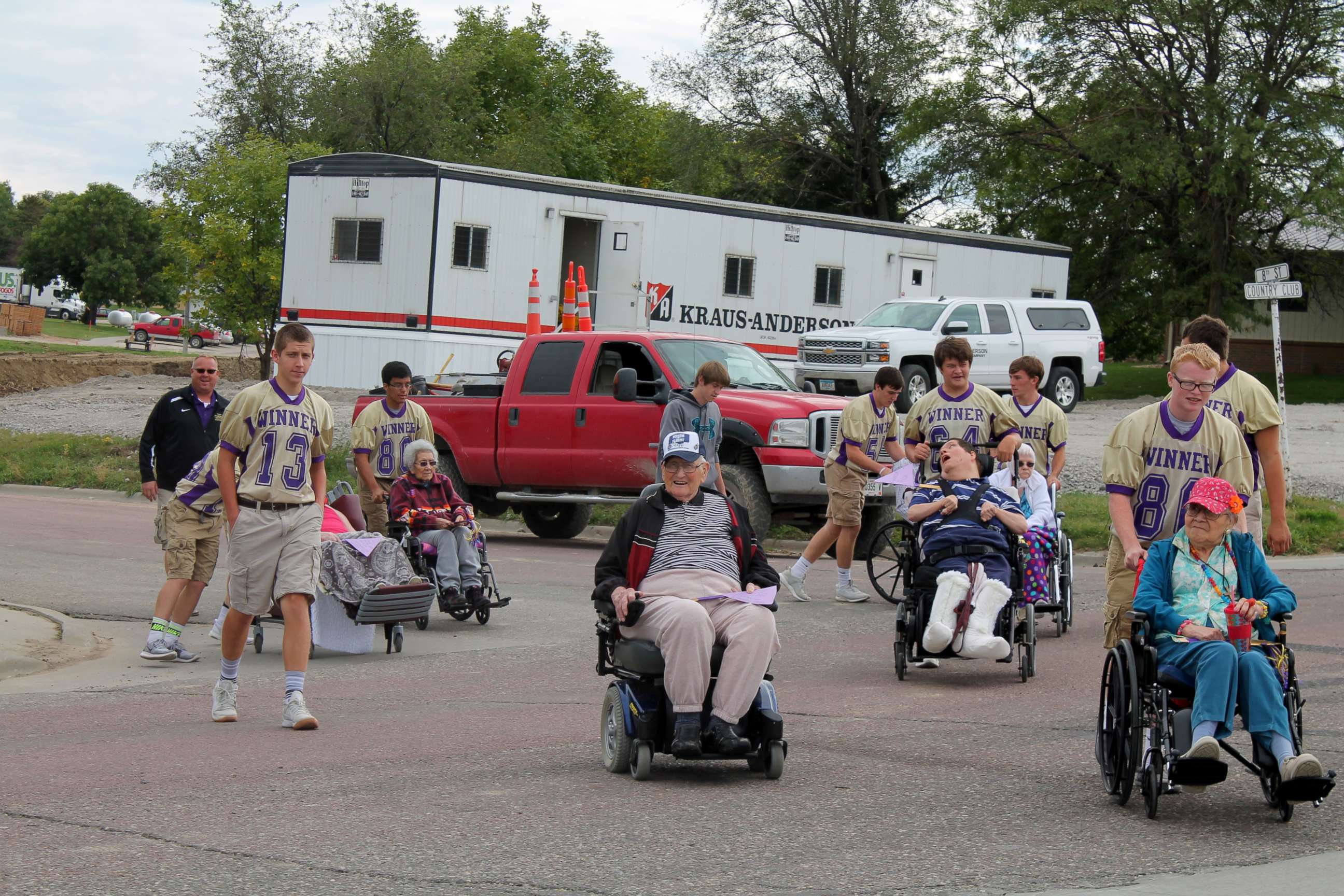 PHOTO: Winner High School football players in South Dakota escorted the residents of Winner Regional Healthcare Center Long-Term Care to their homecoming parade route for them to enjoy the festivities.