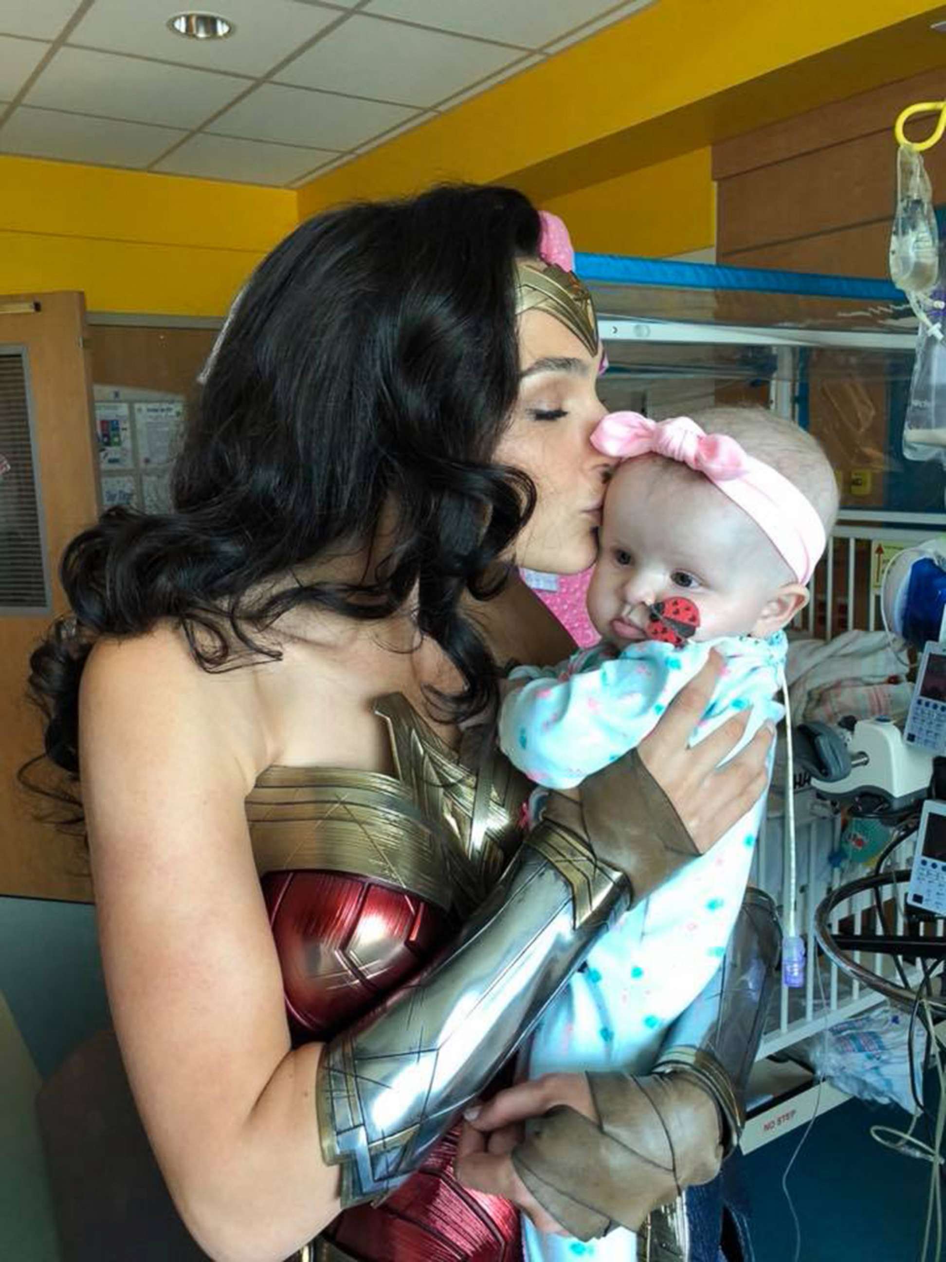 PHOTO: Actress Gal Gadot kisses 7-month-old Karalyne Sahady, who is being treated for acute myeloid leukemia, at Inova Children's Hospital in Falls Church, Va., July 6, 2018.