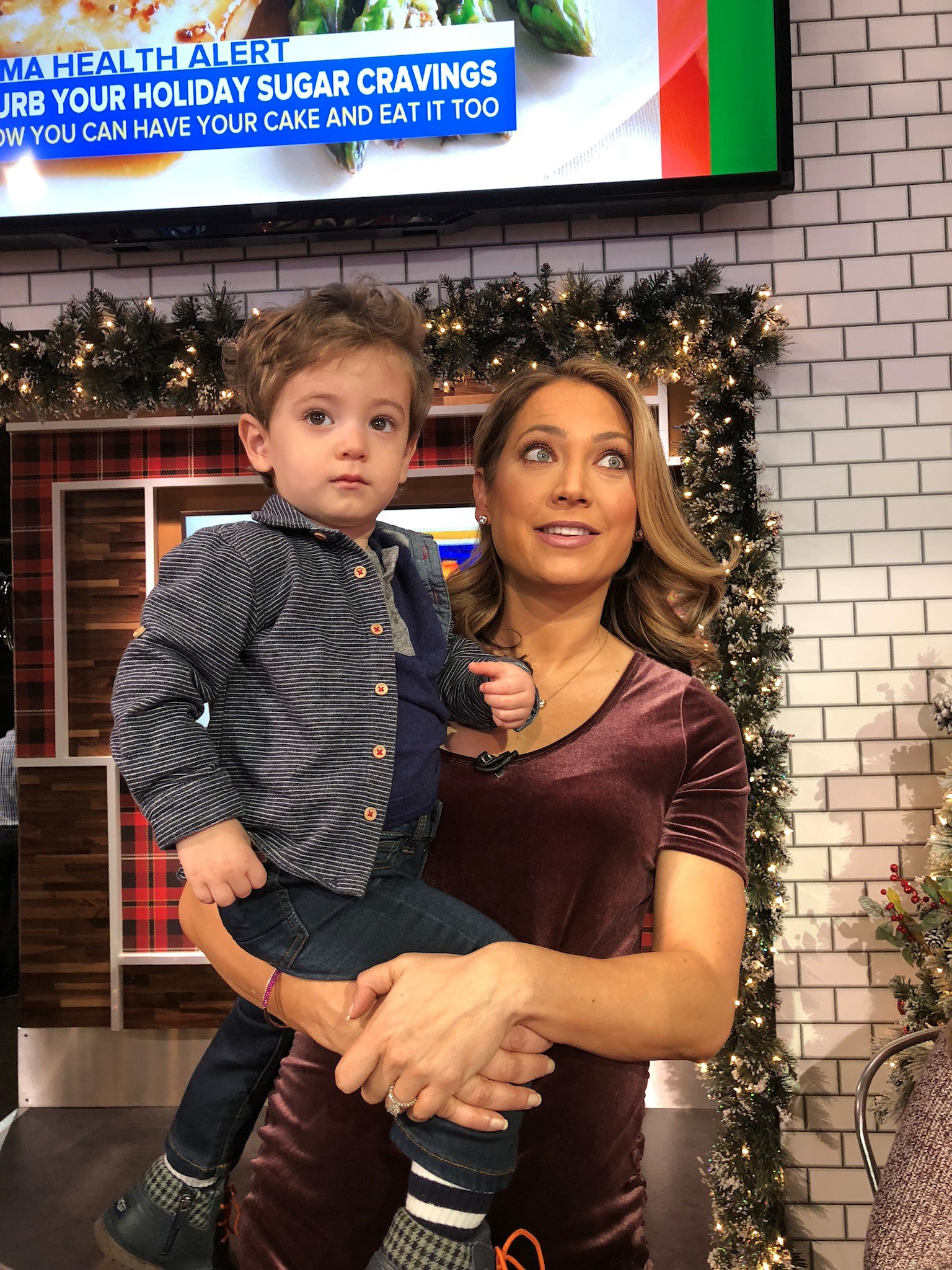 PHOTO: ABC News chief meteorologist Ginger Zee poses with her son, Adrian, on the set of "Good Morning America."