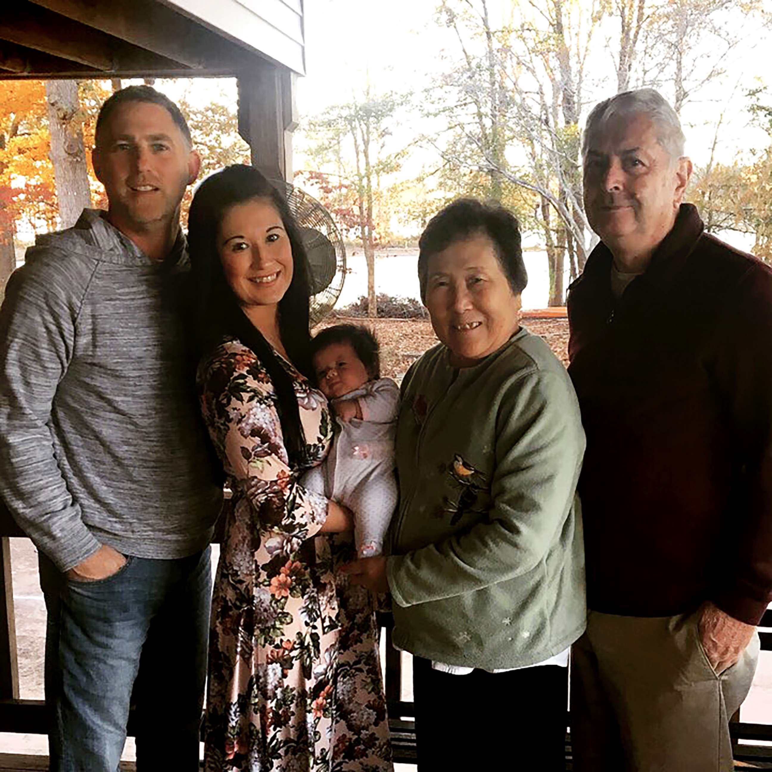 PHOTO: Brad and Christine Stone with their newborn baby, Sadie Mae Stone, along with their parents Setsuko and Robert Harmon.