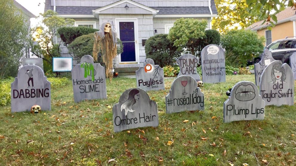 PHOTO: The art teacher's gravestones pay homage to normal seasons and watching live tv.