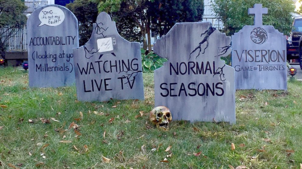 PHOTO: The art teacher's gravestones paid homage to normal seasons and watching live tv.