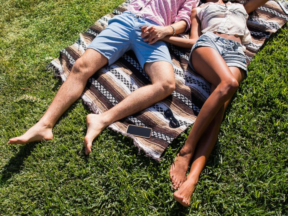 PHOTO: A couple hold hands.