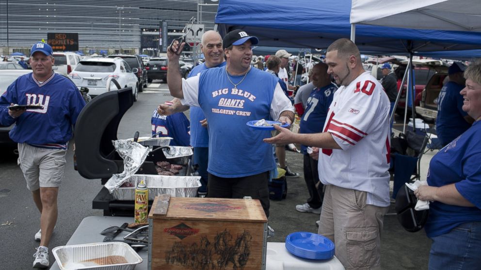 A New York Giants fans enjoy a tailgate party outside the new Meadowlands stadium on Sept. 12, 2010 in East Rutherford, New Jersey.