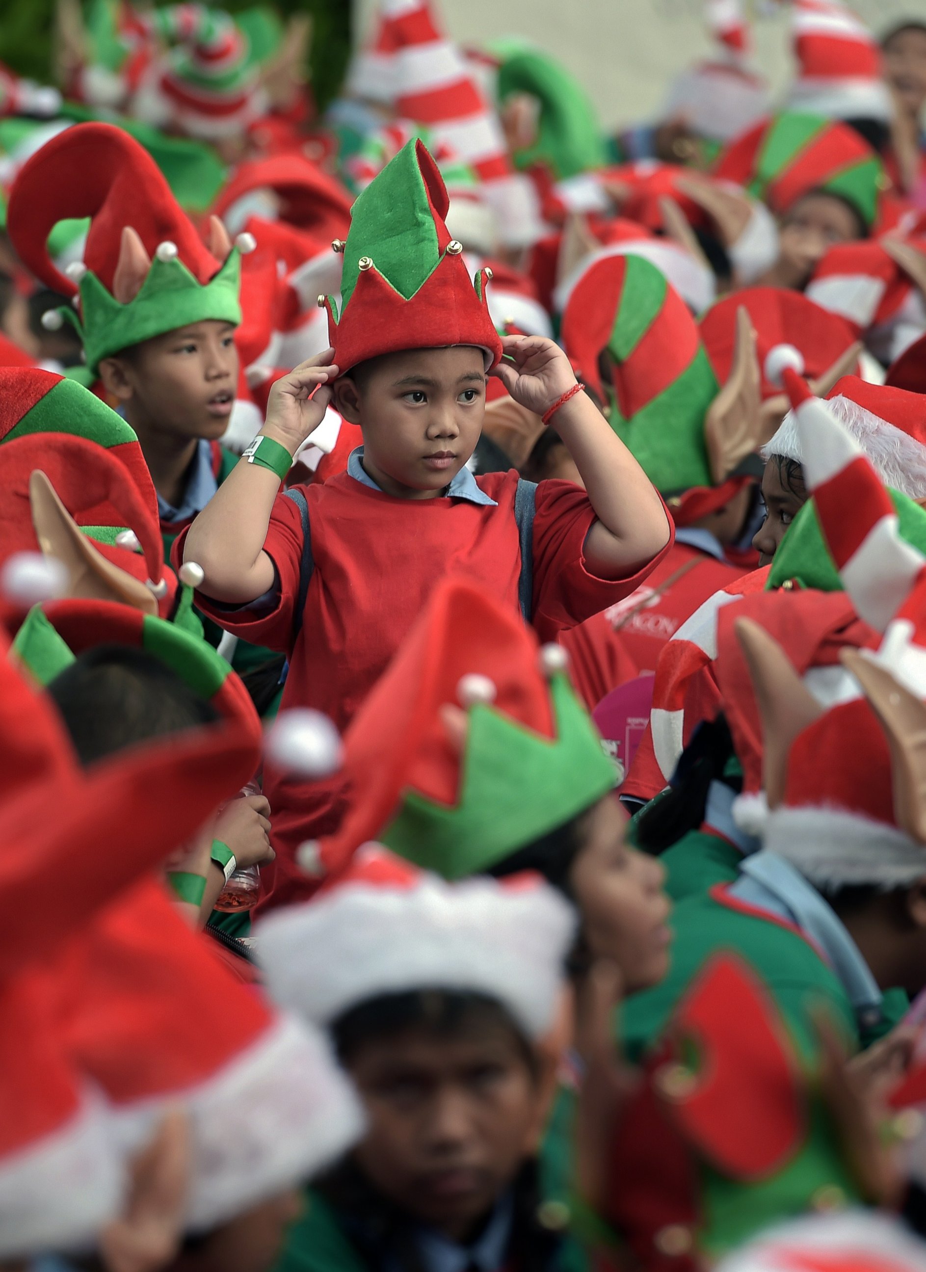 PHOTO: Fourteen children were disqualified for not wearing their elf ears at the event in Bangkok, Nov. 25, 2014. 