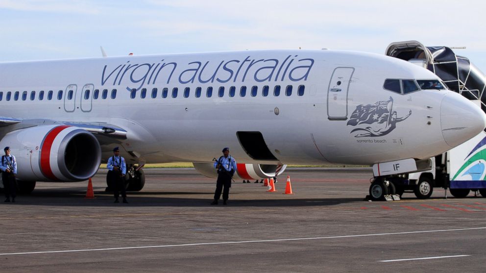 A Virgin Australia Boeing 737-800 sits at Ngurah Rai International Airport in Kuta, Bali on April 25, 2014.