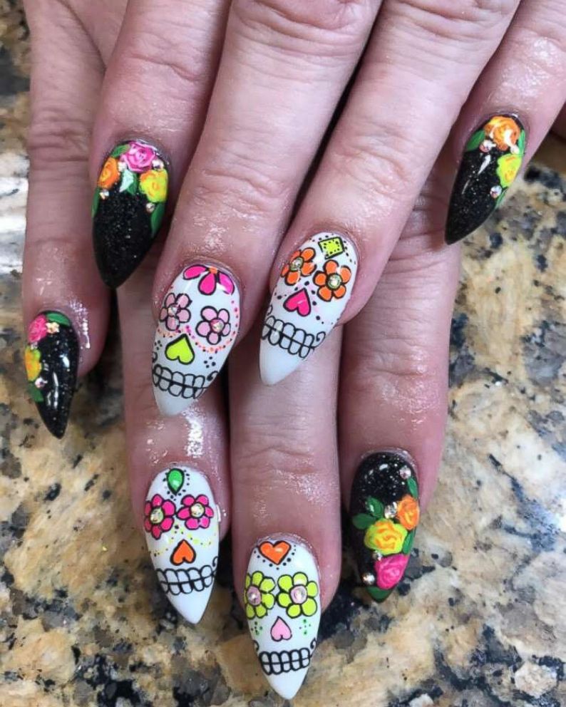 This woman doesn't mess around with her Halloween nail art ...